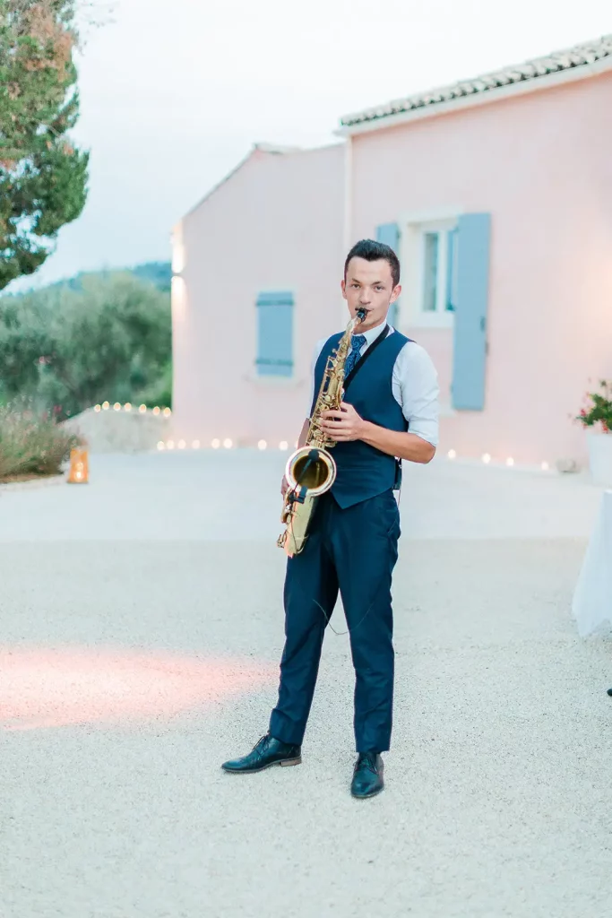 Man playing Saxaphone at a wedding at The Courti Estate.