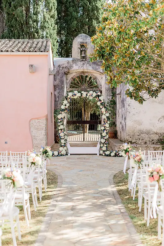 Ceremony seating with floral arch.