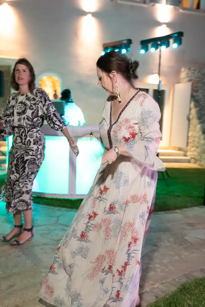 Guests dancing to music outside.