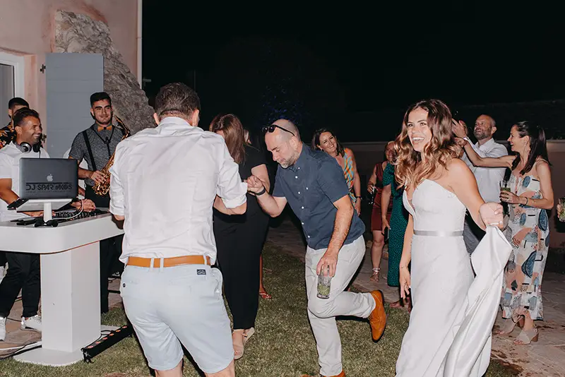 Wedding guests dancing during the evening