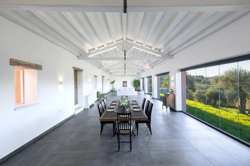 Dining are with large windows looking out to garden and mountain views