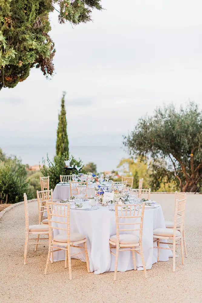 Guest wedding seating with sea views in the background.